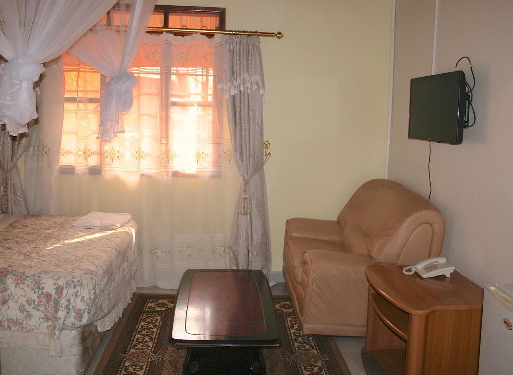 Hotel Acacia Kampala Zimmer foto